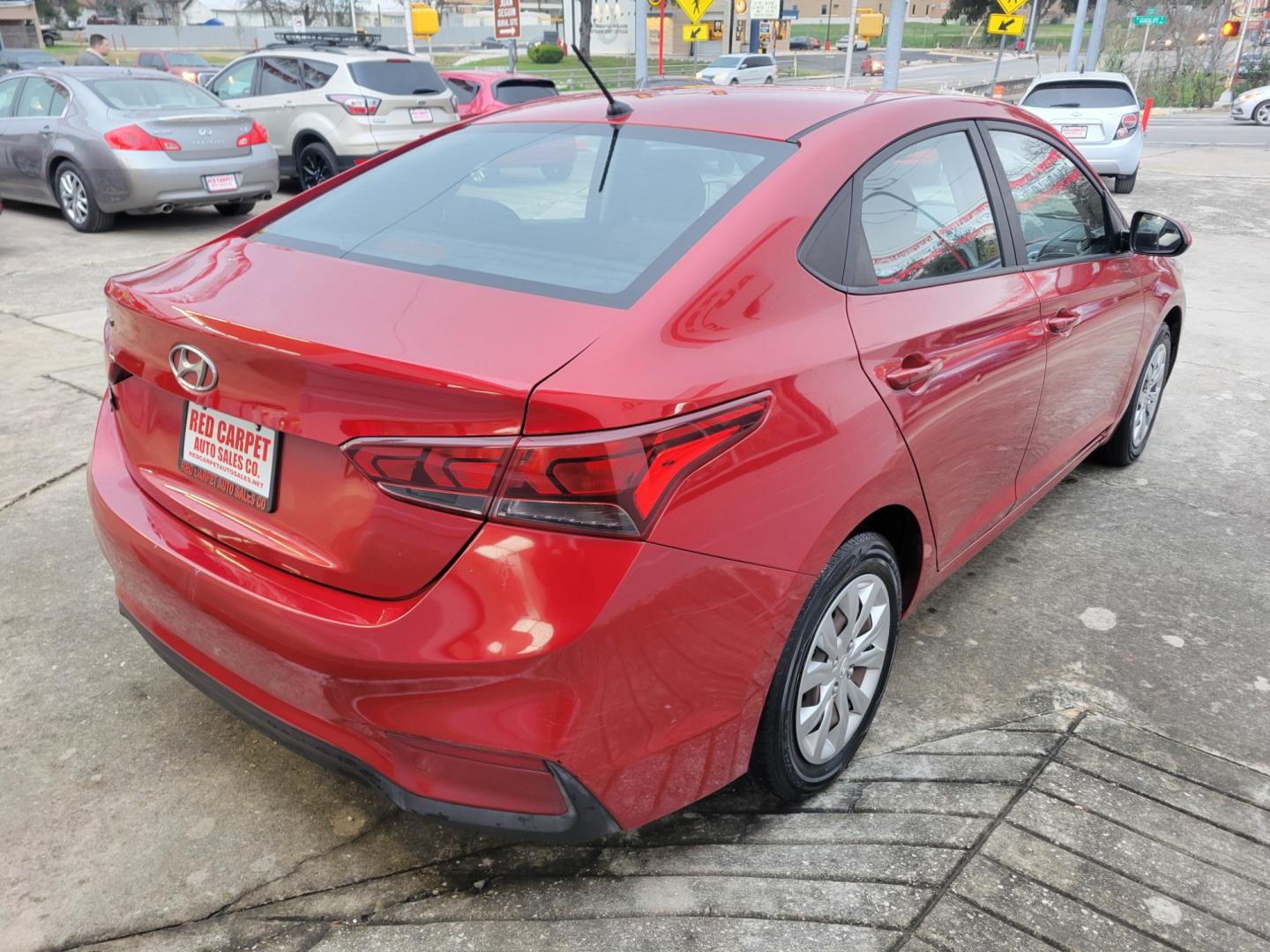 2018 Red Hyundai Accent SEL 4-Door 6A (3KPC24A35JE) with an 1.6L L4 DOHC 16V engine, 6A transmission, located at 503 West Court, Seguin, TX, 78155, (830) 379-3373, 29.568621, -97.969803 - Photo#2